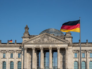 Germany flag on Reichstag building in Berlin, Germany