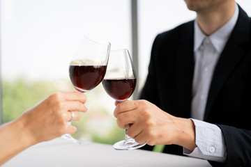  husband and wife having a lunch at restaurant in valentine's day