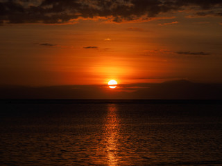 Fototapeta na wymiar Sunset at Christo Rei Beach, Dili, Timor Leste (East Timor)