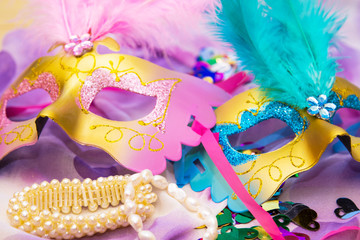 mask, confetti and jewelry, carnival concept