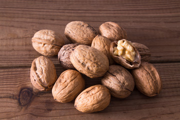 group of nuts on wooden background