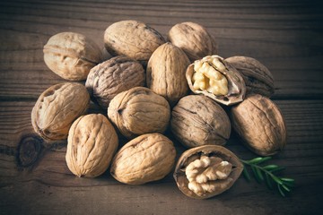 group of nuts on wooden background