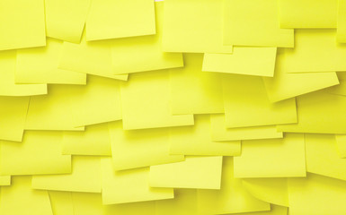many yellow blank sticky note