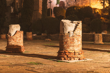 ruined columns by night