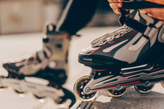 Legs of roller skater, outdoors