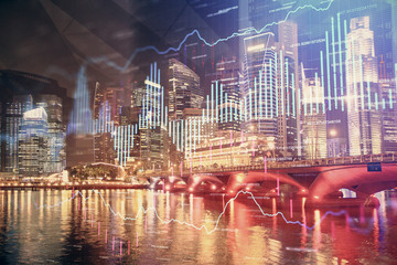 Financial chart on city scape with tall buildings background multi exposure. Analysis concept.