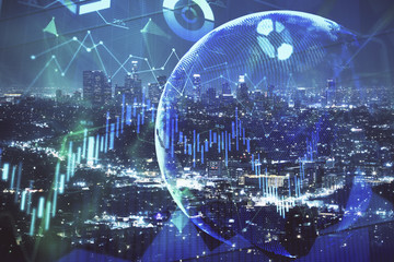 Financial graph on night city scape with tall buildings background multi exposure. Analysis concept.