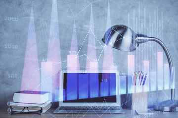 Multi exposure of graph and financial info and work space with computer background. Concept of...