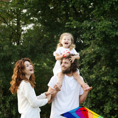 Happy young family in the park