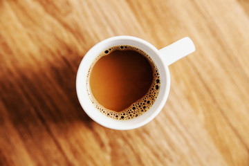 Top view of fresh morning coffee arabica on table.