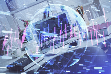 Forex market graph hologram and personal computer on background. Double exposure. Concept of investment.