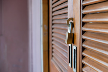 Closeup wooden door lock with copy space