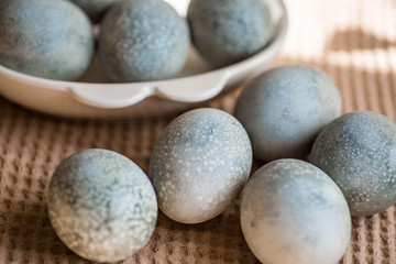 Fototapeta na wymiar Сolored eggs for Easter. Beautiful light blue eggs. Easter background. 
