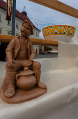Traditional handmade ceramics market at the potters fair in Sibiu, Romania. Happy colorful ceramics