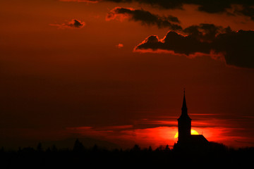 Obraz premium silhouette of the church at sunset