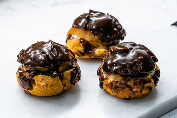 French Dessert Chocolate Eclair with Cream Filled Close Up Macro View