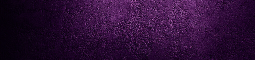 Bright purple grunge background. Colorful web banner. Toned texture of a rough concrete wall surface. Copy space for your design.