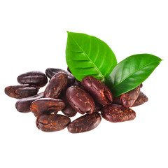 Obraz premium Heap of roasted cacao beans with green leaves isolated on a white background.