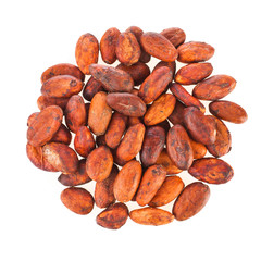 Heap of cacao beans isolated on a white background. Top view.