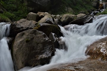 CLOSE UP RIVER WITH ROCKS LONG EXPOSURE