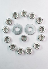 smiley from small nuts and washers