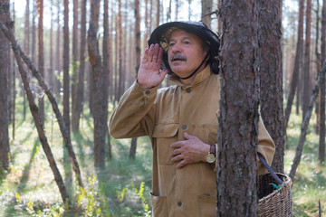 lost mature man in forestshouting trying to find way.