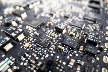 close-up of electronic circuit board with processor, Fragment of the electronic circuit - computer board with chips and components