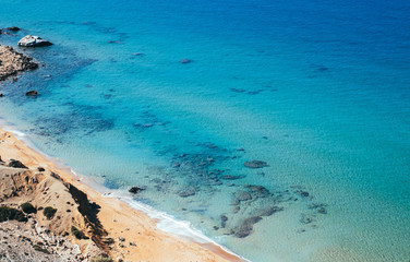 Fototapeta na wymiar The red beach (red sand) at Matala, Crete, Greece.