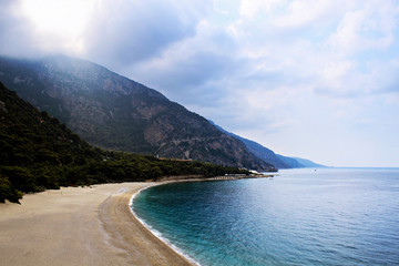 Turkey sea Mediterranean coast ship view rock beach sun sky nature park water summer autumn background landscape trip travel tourism oludeniz