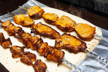 Spiced meat fried in tandoor. Shish kebab. Barbecue.