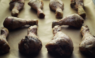 Baked chicken in the oven. Turkey legs on a baking sheet with spices baked in the oven. Snack on...