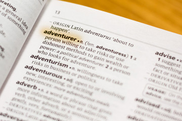 Obraz premium The word or phrase Adventurer in a dictionary.