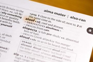 The word or phrase Aloof in a dictionary.