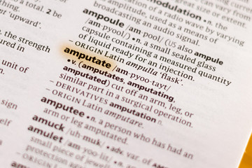 Fototapeta premium The word or phrase Amputate in a dictionary.