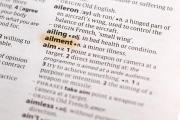 Ivanovsk, Russia - November 19, 2018: The word or phrase Ailment in a dictionary.