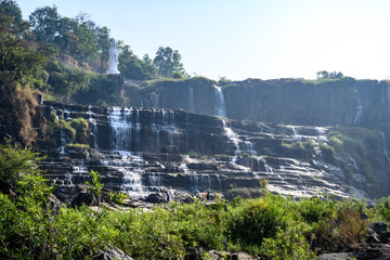 Tropical rainforest landscape with flowing Pongour waterfall in Da Lat, Vietnam