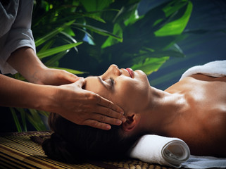 portrait of young beautiful woman in spa environment.  