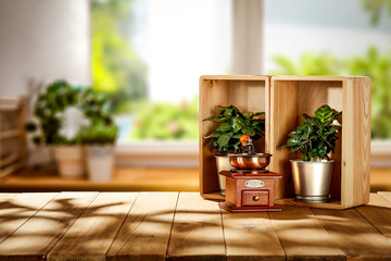 Wooden desk cover of dark shadows and coffee background with window sill 