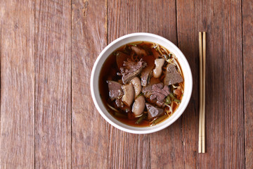  Close up shot of Thailand traditional ekaehla beef soup.( KaoLau) with Rice, food thai style.