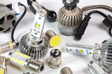 Light bulbs for car lamps. Automotive part in Silvery metallic and black color with wires and...