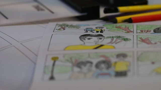 Video Pre-production for film movie storyboard concept: Color pencil drawing on sketch board animation carton template with headphone and slate, Behind process design creative scene layout at studio