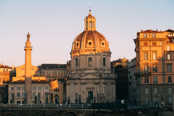 Obraz na płótnie Canvas Rome, Italy - Jan 2, 2020: Trajan's Column (UNESCO World Heritage Site) in Trajan's Forum and church of Santa Maria di Loreto, Rome, Lazio, Italy