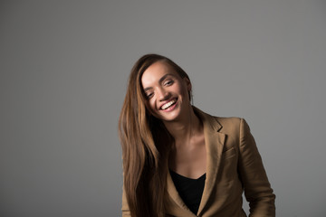 Naklejka premium Portrait of a cute young cheerful girl