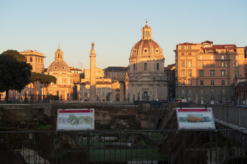 Rome, Italy - Jan 2, 2020: Trajan's Column (UNESCO World Heritage Site) in Trajan's Forum and church of Santa Maria di Loreto, Rome, Lazio, Italy