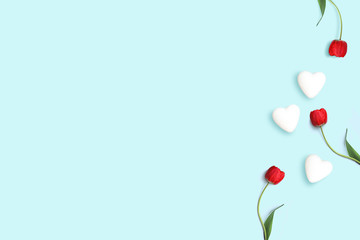 Happy Valentine's day, flowers and hearts isolated on blue background