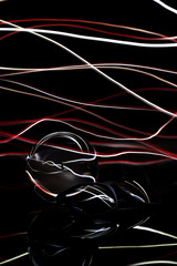 light painting with a glass ball and sunglasses