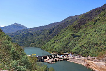 Fototapeta na wymiar View from Gvara fortress to the river Chorokhi and dam, Georgia spring