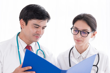 Two doctors have working together with happiness in the hospital.