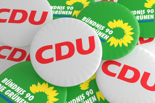 Pile of Buttons With The Logo of The Political Parties CDU And The Greens