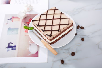Homemade Coffee Mousse Cake on a white plate